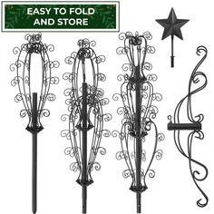 four wrought iron garden stakes with stars on the top, and an easy to fold and store sign above them