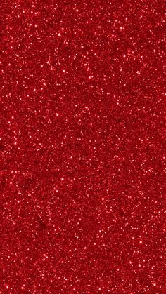 a red glitter background with lots of small sparkles