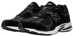 the new balance 990 running shoe is black and white