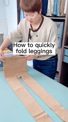 a boy is making a cardboard letter out of paper