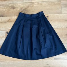 New With Tags Loft Navy A Line Skirt Size 2 Spring Navy Pleated Skirt, Navy Pleated Skirt Bottoms For Spring, Spring Pleated Navy Skirt, Navy Pleated Skirt For Spring, Classic Blue Pleated Skirt For Spring, Spring Navy Pleated Bottoms, Navy Pleated Bottoms For Spring, Elegant Navy Full Skirt, Navy Knee-length Skirt For Spring