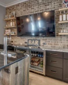 a bar with brick walls and shelves filled with bottles, glasses, and other items