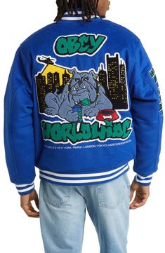 Obey Worldwide Roll Call Varsity Jacket Urban Long Sleeve Sport Coat For Streetwear, Urban Long Sleeve Sport Coat For College, Varsity Hooded Outerwear With Graphic Print, Varsity Outerwear With Graphic Print, Varsity Style Long Sleeve Outerwear With Graphic Print, The Streets, Varsity Jacket, Rolls