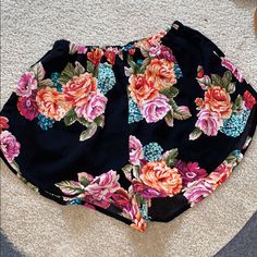 This Are Flower Shorts From Charlotte Russe. They Are Super Cute, Comfortable Shorts For The Summer. Never Worn. Trendy Floral Print Beach Shorts, Trendy Floral Print Shorts For Beach Season, Black Floral Print Vacation Bottoms, Vacation Black Floral Print Bottoms, Summer Floral Print Shorts, Floral Print Beach Shorts, Floral Print High-waisted Shorts For Beach, Summer Floral Print Shorts For Day Out, Floral Print Summer Shorts For Day Out