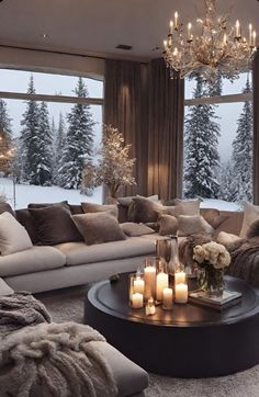 a living room filled with lots of furniture and candles