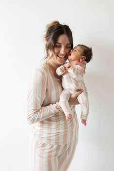 Indulge in the luxurious comfort of our Women's Bamboo Pajamas in Candy Stripe! Made with soft, breathable bamboo fabric, these two-piece long sleeve pajamas will keep you cozy and stylish. With sizes ranging from XS to XXL and a chic pink and cream stripe design, you'll never want to take them off! These pajamas feature snaps down the front for easy accessibility for breastfeeding moms and elastic waistbands ensure max comfortability. Milk Baby, Long Sleeve Pajamas, Diaper Bag Accessories, French Baby, Baby Sleep Sack, Bamboo Pajamas, Boy Outerwear, Cozy Pajamas, Chic Pink