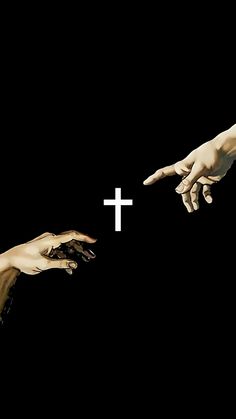 two hands reaching out towards each other with the cross painted on it's side