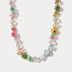 Introducing the Bubble Gum Chip Stone Beaded Necklace, a vibrant multi-color stone necklace perfect for summer. This playful accessory features an array of natural stones, including quartz and crystal, creating a lively and eye-catching design. Accented with 18K gold-plated brass, each chip stone is carefully selected to reflect a rainbow of colors, embodying the spirit of warm, sunny days. Lightweight and versatile, this necklace is ideal for adding a pop of color to your summer wardrobe. Whether you're at the beach or a garden party, the Bubble Gum Chip Stone Beaded Necklace is your go-to accessory for effortless, nature-inspired elegance. DETAILS Plating: 18K Gold Materials: 18K Gold on Brass, Natural Stone, Quartz, Crystal Measurements: Length: 16.14"(41cm) + Extender: 2.36"(6cm) Bead Multicolor Crystal Necklaces With Gemstone Beads, Multicolor Gemstone Beaded Crystal Necklaces, Stone Chip Bead Jewelry, Adjustable Multicolor Crystal Necklace With Colorful Beads, Multicolor Gemstone Beads Crystal Necklace, Multicolor Faceted Beads Crystal Necklace, Rainbow Beaded Necklace, Chip Bead Jewelry, Stone Beaded Necklace