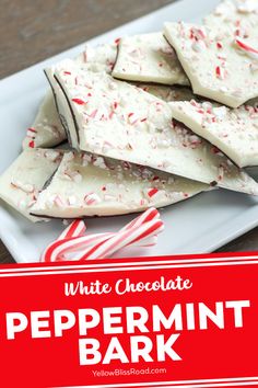 white chocolate peppermint bark on a plate with candy canes