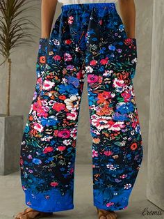 Eromis - Womens Floral Print Wide Leg Pants: Stylish, Comfortable and Versatile Casual Loose Pants for Spring and Summer Fashion Multicolor Vacation Pants With Pockets, Non-stretch Printed Pants For The Beach, Baggy Floral Print Trousers, Spring Baggy Multicolor Bottoms, Baggy Wide Leg Floral Print Pants, Spring Multicolor Baggy Bottoms, Baggy Summer Pants With Floral Print, Baggy Floral Print Pants For Summer, Baggy Printed Pants For Spring