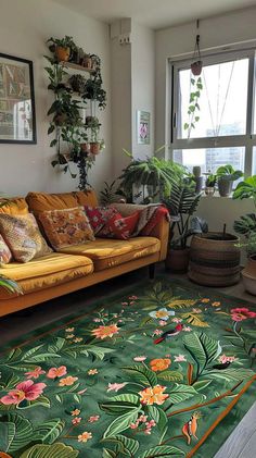 a living room filled with lots of plants next to a large rug on the floor