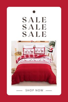 a bed with red sheets and pillows in front of a christmas sale sign that says sale sale