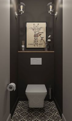 a bathroom with a toilet and some lights