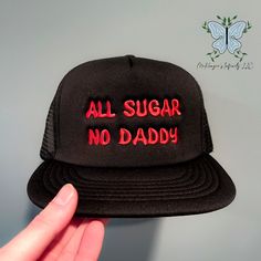 The All Sugar No Daddy Embroidered FOAM Flatbill Snapback Trucker Cap/Hat is the perfect accessory for those who want to make a bold statement. This cap features stylish embroidery and a trendy flatbill design, making it a standout piece. With its snapback closure, it offers a comfortable and adjustable fit. Show off your unique style with this must-have cap! Fabric: 100% polyester foam Structure: Structured Profile: High Closure: Plastic snapback One Size Fits Most Black Snapback Trucker Hat With Letter Embroidery, Black Embroidered Snapback Trucker Hat, Snapback Hat With Embroidered Logo, One Size, Black Six-panel Snapback Hat With Embroidered Logo, Rhinestone Hoodie, Black 5-panel Trucker Hat With Embroidered Logo, Nurse Hat, Easter Outfit, Thanksgiving Outfit