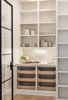 the kitchen is clean and ready to be used as a storage area for dishes or other items