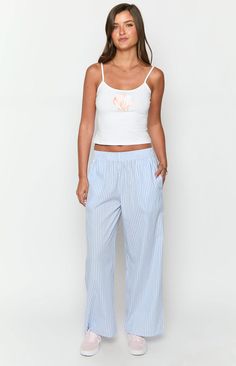 Blue Stripe Pants

How to style:
Our Mahalia Light Blue Stripe Pants are a Summer () dream with their Lightweight material and adorable stripe print! Perfect for your next get away or brunching with the girls, you'll find any excuse to wear these ultra comfy pants ()! Pair with your fave white basic top () and sandals to complete the look.

Features:


  
 * Elastic waistband
 
 * Side pockets
 
 * Full length
 
 * Loose fit
 
 * Lightweight material
 
 * Wide leg style
 
 * Non-stretch material Cotton Pants For Summer Pajama Party, Casual Spring Bottoms For Pajama Party, Casual Straight Pants For Pajama Party, Blue Striped Pants For Spring, Blue Vertical Stripes Pants For Spring, Casual Pants For Summer Pajama Party, Cotton Straight Leg Pajama Party Bottoms, Cotton Straight Leg Bottoms For Pajama Party, Cotton Straight Leg Pajama Bottoms