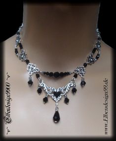 A very elegant necklace in the Gothic style, which, like all my pieces of jewelry, was made with great care and attention to detail. The necklace was made from silver-plated metal ornaments with black faceted glass beads and black gemstones. The chain is adjustable from approx. 35 cm - 45 cm, a black drop hangs on the extension chain. UNIQUE Black Gothic Necklace, Vampiric Jewelry, Gothic Jewelry Diy, Black Gemstones, Gothic Choker Necklace, Witch Necklace, Metal Ornaments, Gothic Chokers, Diy Jewelry Projects