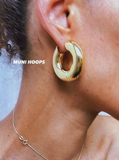 Introducing Muni Hoop | Gold, the latest addition to our collection. Their hollow design provides a minimalist statement while perfectly balancing on the earlobe. reclaimed brass waterproof designed for balance and feels weightless when wearing Thick Gold Hoop Earrings, Thick Gold Hoops, Hollow Earrings, Kay Jewelry, Dainty Tattoos, Gold Statement Earrings, Hollow Design, Gold Polish, Cuff Bangles