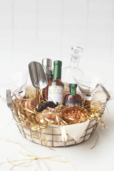 a basket filled with lots of bottles and spoons