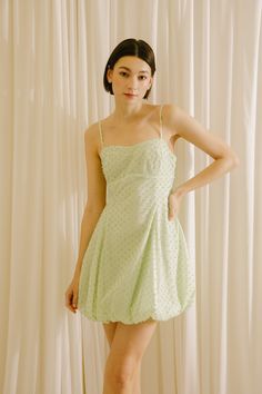 Look cute as a button in this Alina Mint Green Dots Mini Dress. The sweetheart neckline adds a romantic touch, while adjustable spaghetti straps and center bust darts provide a perfect fit. Flared empire waist and gathered hem highlight your waistline for a totally enviable look. Material:Polyester and Cotton