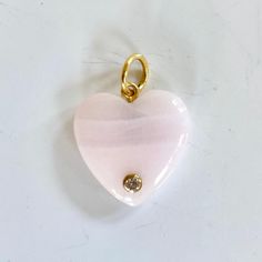 Super cute pink calcite heart pendant with diamond accent. Heart 20x19mm 14K Gold Diamond 0.28ct Cheap Jewelry With Heart Pendant Charms, Cheap Heart Charm Jewelry For Engagement, Luxury Cubic Zirconia Jewelry With Heart Charm, Luxury Elegant Heart Shaped Charms, Pink Calcite, Heart Gemstone, Cute Pink, Heart Charm, Heart Pendant