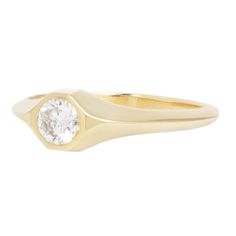 Confident and bold, this solitaire signet ring by WWAKE features a twinkling white antique old European cut diamond. High polish 14k gold frames the stone in a subtle octagonal shape. A flattened knife-edge band allows this stunning signet to stack with other rings. Stones: .25ct White Antique Old European Cut Diamond (Color G/H, VS2) Metal: 14k Yellow GoldMeasurements: Stone length: 4mm, Setting width: 5mm, Setting height: 3.4mm, Band width: 2.9-1.5mm taper Shipping and Delivery: IN STOCK items Modern Formal Signet Ring With Single Diamond, Classic Yellow Gold Signet Ring With Single Diamond, Timeless Octagon Diamond Ring With Bezel Setting, Timeless Signet Ring With Single Diamond, Classic Gold Octagon Signet Ring, Classic 14k Gold Signet Ring With Diamond, Timeless Diamond White Round Cut Signet Ring, 14k Gold Octagon Diamond Ring With Bezel Setting, Formal Octagon Ring With Single Cut Diamonds