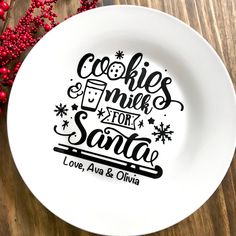 a white plate with the words cookies and wine for santa on it