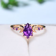 Vintage Pear Shaped Amethyst Engagement Ring Unique Crescent moon Purple amethyst gold wedding ring women celestial anniversary gift for her ≫≫ Item Details  Make every ring to order, all rings are handmade in the United States.  Metal: Solid 10K & 14K & 18K Gold  Gold Color: Rose gold, Yellow gold, White gold Engagement ring Center stone:  5x7mm pear shaped natural amethyst Accent stone: Amethyst ➽THE BEST QUALITY CRAFTSMANSHIP: All rings for women at Yridesign are made only with the best quali Moon Phase Ring For Wedding, Spiritual Purple Amethyst Wedding Ring, Purple Spiritual Wedding Jewelry, Mystical Purple Promise Ring Jewelry, Mystical Crescent Jewelry For Wedding, Celestial Purple Round Jewelry, Purple Celestial Round Jewelry, Spiritual Amethyst Wedding Ring, Celestial Amethyst Gold Jewelry