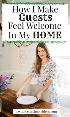 a woman holding a plate with the words how i make guests feel welcome in my home