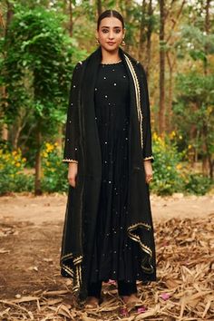 Black anarkali featuring scattered mirror work all over with kasap, pearl, pita, thread embroidery on the neckline and sleeve hem. Paired with a pant and a gota lace, tassel detailed dupatta. - Aza Fashions Designer Black Anarkali Set With Cutdana, Unstitched Black Churidar With Cutdana Details, Black Straight Kurta Anarkali Set With Cutdana, Black Cutdana Anarkali Set With Straight Kurta, Black Anarkali Set With Cutdana For Designer Wear, Black Churidar With Cutdana For Festive Occasion, Black Cutdana Churidar For Festive Occasions, Black Cutdana Churidar For Eid, Festive Black Anarkali Set With Cutdana