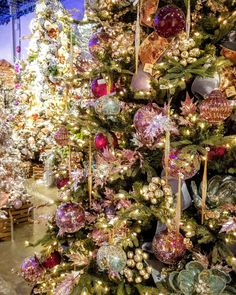 a christmas tree is decorated with ornaments and lights