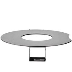 an oval metal table top on a white background