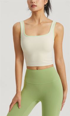 This tank top, made with 80% Nylon and 20% Spandex, is an embodiment of our brand's mission to harmonize yoga, meditation, and energy healing. Designed for everyday loungewear, its contemporary fit is perfect for the spring/summer season. The molded cup feature adds a touch of elegance, making this top a perfect blend of comfort and style. Enjoy the ease of machine wash care instructions. Celebrate your unique journey with this versatile piece from our collection. Summer Yoga Tank Top With Built-in Bra, Summer Tank Activewear For Pilates, White Tank Top With Built-in Bra For Yoga, Summer Seamless Tank Top For Pilates, Versatile Summer Yoga Tank Top, Seamless Tank Top For Pilates In Summer, Compressive Sleeveless Sports Bra For Spring, Versatile Tank Top For Pilates And Summer, Summer Moisture-wicking Tank Top For Pilates