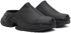 Grained faux-leather mules in black. · Rubberized logo patch at outer side · Faux-suede lining · Treaded foam rubber sole Supplier color: Black beyond leather Black Leather Slip-on Mules, Black Clogs With Leather Footbed For Work, Casual Black Mules With Textured Sole, Black Leather Sole Slip-on Clogs, Black Slip-on Clogs With Leather Sole, Leather Clogs With Textured Sole For Work, Casual Black Mules With Leather Footbed, Modern Black Round Toe Clogs, Black Casual Mules With Leather Sole