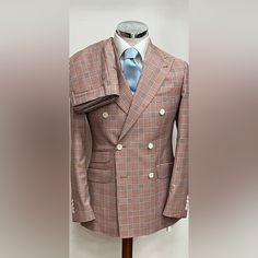 Stunning Rose Pink Plaid Double Breasted Super 150 Cerruti 1881 Wool Suit. With Tom Ford Like Peak Lapel. Ticket Pocket, 10 Inch Double Vent, 4.5 Inch Hand Stitched Peak Lapel. Flat Front Pant. Made In Italy. This Brand New Suit Will Exceed Your Expectations Or Return For Full Refund. Sells For $1800-$2500 At The Stores We Wholesale To Across The Country. Luxury Pink Blazer For Business, Pink Luxury Blazer For Business, Luxury Pink Business Blazer, Pink Luxury Business Blazer, Luxury Pink Blazer For Semi-formal Occasions, Pink Luxury Blazer For Semi-formal Occasions, Luxury Pink Suits For Work, Elegant Tailored Pink Three-piece Suit, Elegant Pink Three-piece Suit For Formal Occasions