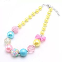 This Adorable Necklace Has Yellow, Pink, Blue, White & Clear Color Attributes. You Won't Have Many Problems Coordinating This Piece With Most Outfits! Most Suitable For Ages 3yrs+. View Our Closet For Tons Of Other Styles Available And Numerous Children Items. #Boutique #Instafashion #Necklace #Disney #Princess #Yellow #Canary #Blue #Baby #Toddler #Bundle #Outfit #Clothes #3t #4t #5t #6 #7 #8 #10 #12 #14 Disney Princess Yellow, Bubble Gum Necklace, Yellow Canary, Preppy Bracelets, Pink Heart Earrings, Diy Chain, Gold Locket Necklace, Rubber Band Bracelet, Bubblegum Necklace