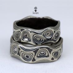 "These are unique mokume gane forged wedding or engagement rings, made of 14K white gold and sterling silver (oxidized). Can be ordered in pair as well as separatly up to your preferences in size, width, thikness and design. They are 100% handmade forged. The price will depend on final weight of the rings. Koan mokume gane jewellery My name is Andrew Seginovich, designer, maker and creator of Koan Mokume gane Jewelry. Welcome to my shop! The studio was created in 2005, and since that time I've b Silver Patina Jewelry For Weddings, Rings Etsy, Mode Hippie, Mokume Gane, Dope Jewelry, Textured Ring, Funky Jewelry, Jewelry Lookbook, Affordable Jewelry