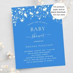 a blue baby shower with white stars on it