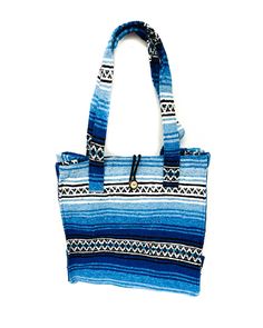 Mexican Blanket Tote Bag Handmade in Mexico Made from recycled materials Great for groceries, the beach, vacations, or as a purse! ** Each bag is handmade so there may be slight color variation from photos ** Summer Blue Handwoven Shoulder Bag, Blue Handwoven Summer Shoulder Bag, Large Blue Beach Bag For Everyday Use, Large Blue Beach Bag For Travel, Handmade Blue Beach Bag For Market, Blue Handwoven Beach Bag For Travel, Eco-friendly Blue Tote Beach Bag, Handwoven Blue Shoulder Beach Bag, Blue Handwoven Shoulder Beach Bag