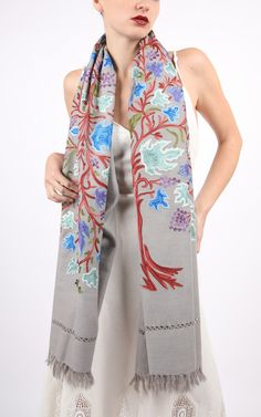 "This shawl features the beautiful craftsmanship of the Kashmir Valley Artist in its paisley embroidery that will help a casual outfit stand out. Designed to keep you cosy and stylish during the winter season. It redefines festive glamour with its nostalgic appeal, making it the perfect addition to elevate your style. Whether you're in search of a considerate winter gift or a versatile layering piece, our wool shawl have you covered. Embrace the comfortable snugness and timeless elegance it brin Kashmir Valley, Paisley Embroidery, Embroidered Shawl, Silk Stoles, Kashmiri Shawls, Big Scarf, Wool Shawl, Pashmina Shawl, Scarf Gift