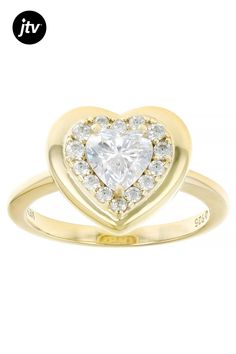 Bella Luce�� white diamond simulant 1.63ctw heart and round, Eterno��� 18k yellow gold over sterling silver heart ring. Measures approximately 0.81" L x 0.44" W and is not sizable. The diamond equivalent weight is 0.98ctw. Heart-shaped Yellow Gold Diamond Ring With Center Stone, Valentine's Day Yellow Gold Heart Ring With Cubic Zirconia, Yellow Gold Cubic Zirconia Heart Ring, Gold Heart Ring With Center Stone For Valentine's Day, Gold Heart Ring With Halo Setting For Valentine's Day, Valentine's Day Halo Cubic Zirconia Jewelry, Valentine's Day Cubic Zirconia Halo Jewelry, Heart-shaped Yellow Gold Jewelry With Center Stone, Heart Shaped Yellow Gold Jewelry With Center Stone