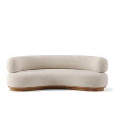 the curved sofa is made from wool and wood