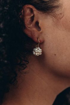 Say hello to our "Maisie" cluster pearl dangle earrings.  These dainty, French vintage style inspired pearl earrings comes with an easy, click-style, latch back, mini huggie hoops, made with real 925 sterling silver coated with a layer of 18k GOLD.  Dangling to the hoops are genuine freshwater small baroque cluster pearls, held together with clear wiring and features gold plated sterling silver hoop connector.  Simply take the attachment off to wear the mini gold hoops on its own, or place the c Dainty Pearl Charm Earrings For Parties, Dangle Hoop Earrings With Pearl Charm For Party, Pearl Charm Dangle Hoop Earrings For Party, Party Hoop Earrings With Pearl Charm And Dangle, Small Hoop Pearl Chain Wedding Jewelry, Wedding Dangle Hoop Earrings With Pearl Chain, Small Hoop Single Pearl Earring For Wedding, Single Small Hoop Pearl Earring For Wedding, Dainty Hoop Earrings With Pearl Charm For Wedding