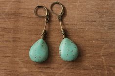 Turquoise Earrings Boho Earrings Dangle Earrings Teardrop Earrings Boho jewelry Bohemian Earrings Gift For women Color : Turquoise Teardrop Beads 20mm x 15mm Finish : Antiqued Brass findings Size : inches including the antiqued brass lever backs Ear wires : antique brass lever backs Brass Earrings section : https://www.etsy.com/shop/NtikArtJewelry?ref=seller-platform-mcnav&section_id=16059931 Thanks for looking Bohemian Turquoise Teardrop Earrings For Jewelry Making, Bohemian Teardrop Earrings With Lever Back, Elegant Handmade Turquoise Teardrop Earrings, Handmade Bohemian Turquoise Teardrop Earrings, Bohemian Turquoise Teardrop Earrings, Bohemian Turquoise Earrings With Intricate Design, Red Earrings Dangle, Boho Jewelry Earrings, Earthy Turquoise Dangle Earrings