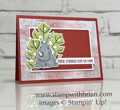 a close up of a card with a hippo on the front and bottom corner