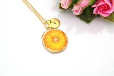 Gold Lemon Charm Necklace, Orange Slice Charm, Orange Charm, Fruit Food Charm, Foodie Gift, Personalized Gift, HOW TO ORDER 1) Select the quantity 2) Select stamp the initial and chain length 3) Add to cart DESCRIPTION ♥ Stainless steel chain, electroplated gold chain ♥ Stainless steel disc, electroplated gold 10mm. ♥ Alloy Enamel Pendants, 25 mm x 21mm ** Conversion: 1 inch = 25.4mm or 1mm = 0.0393 inches** Additional initial charm https://www.etsy.com/listing/250795439 Add a birthstone charm h Handmade Orange Charm Necklace For Gift, Handmade Orange Charm Necklace As A Gift, Personalized Yellow Charm Necklaces For Gift, Personalized Yellow Charm Necklace As Gift, Personalized Yellow Charm Necklace For Gift, Enamel Pendants, Necklace Orange, Food Charms, Orange Slice