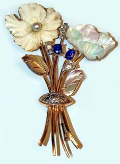 For Sale on 1stDibs - GOLDEN BROOCH VINTAGE (MADE CIRCA 1900) SHAPED AS FLOWER BOUQUET, WITH VARIOUS GEMS: GOLD (14 ct / 585) COVERED WITH BRILLIANTS (VINTAGE CUT / 0.30 ct), Vintage Multi-stone Brooches For Anniversary, Vintage Multi-stone Brooches For Formal Occasions, Antique Multi-stone Brooches For Formal Occasions, Vintage Yellow Gold Flower Brooch, Vintage Multi-stone Yellow Gold Brooches, Vintage Yellow Gold Flower Brooches, Vintage Yellow Gold Multi-stone Brooches, Vintage Multi-stone Gold Brooches, Vintage Gold Multi-stone Brooches