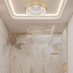 a bathroom with a chandelier and marble walls