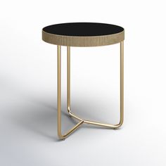 a black and gold side table on a white background with the top off to the side