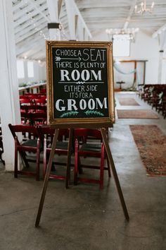 a sign in the middle of a room that says choose a seat there is plenty of room either side or groom